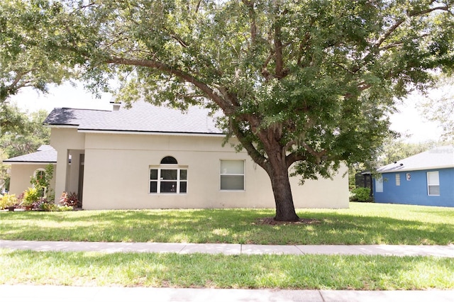 exterior space with a yard