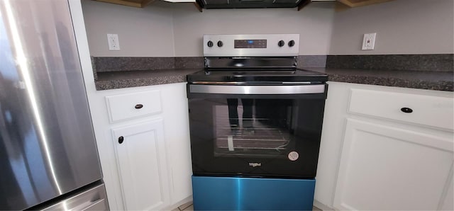 kitchen featuring white cabinets and stainless steel appliances