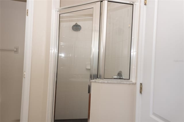 bathroom featuring an enclosed shower