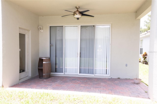 view of patio / terrace featuring ceiling fan