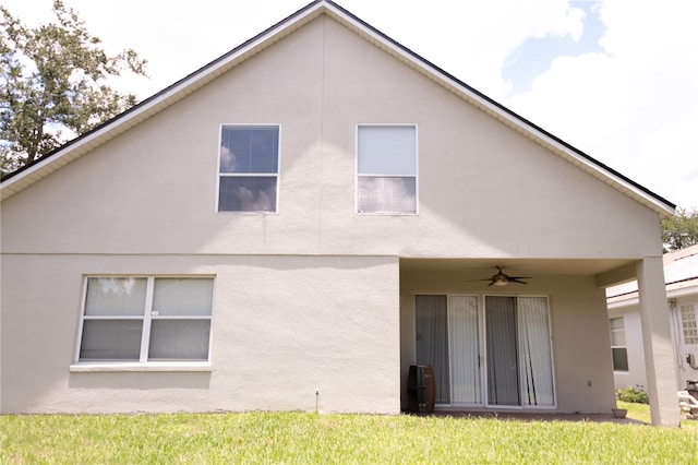 back of house featuring ceiling fan