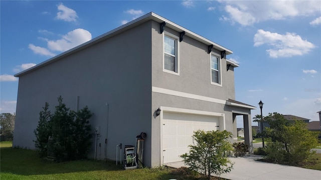 view of property exterior with a garage