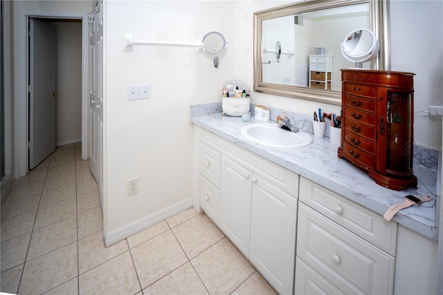 bathroom featuring vanity and tile patterned flooring