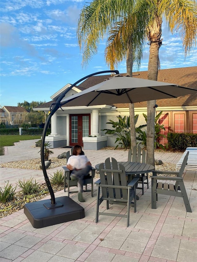 view of patio featuring french doors