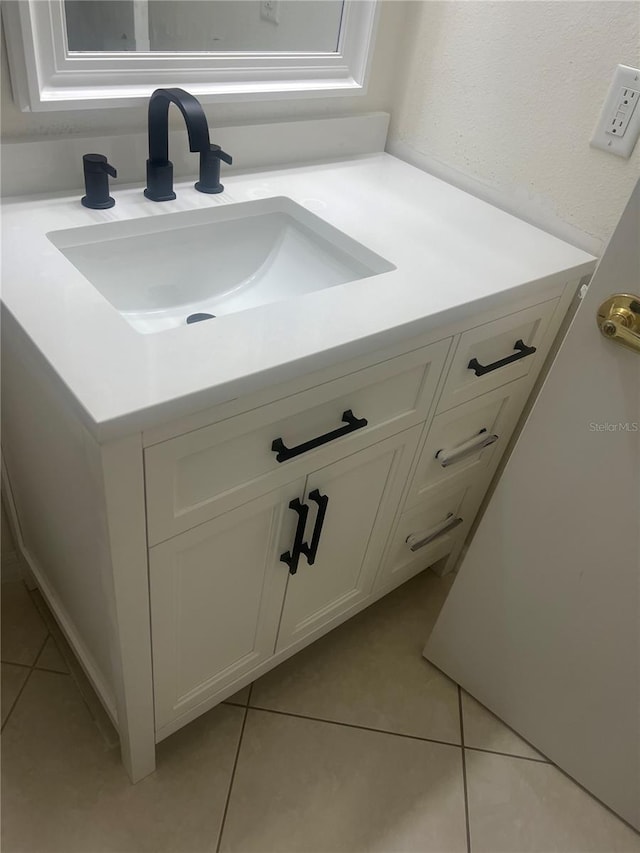 bathroom featuring vanity and tile patterned floors