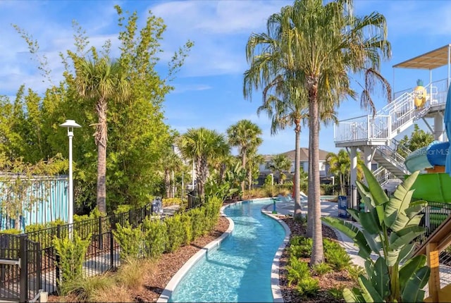 view of home's community with a pool