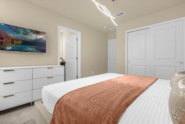 carpeted bedroom featuring a closet