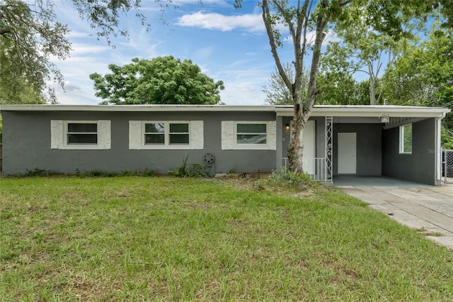 single story home with a carport and a front yard