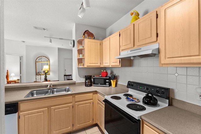 kitchen with white appliances, light brown cabinetry, sink, decorative backsplash, and rail lighting