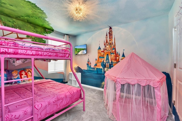 carpeted bedroom with a textured ceiling