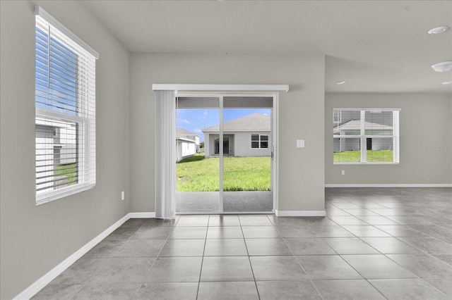 view of tiled spare room