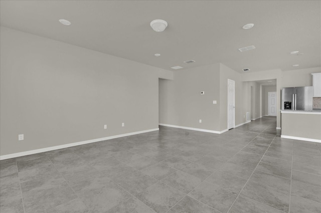 interior space with light tile patterned floors