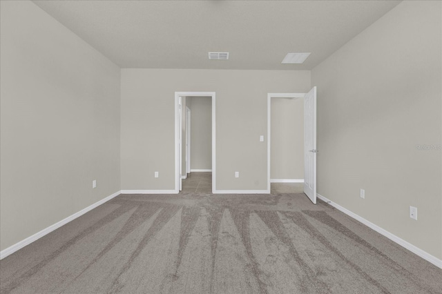 unfurnished bedroom with carpet