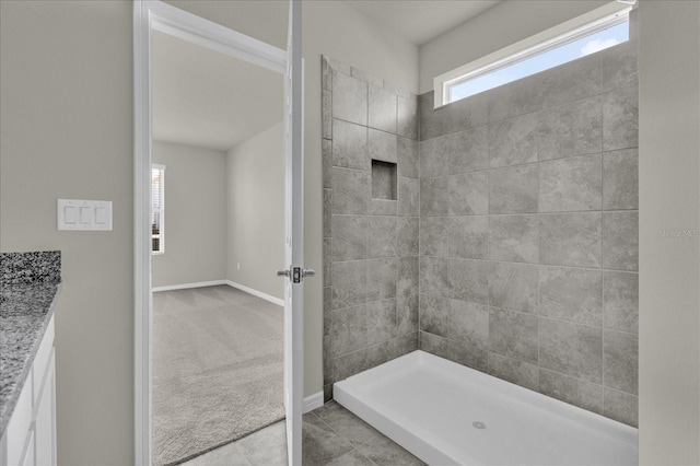 bathroom featuring vanity and tile patterned flooring