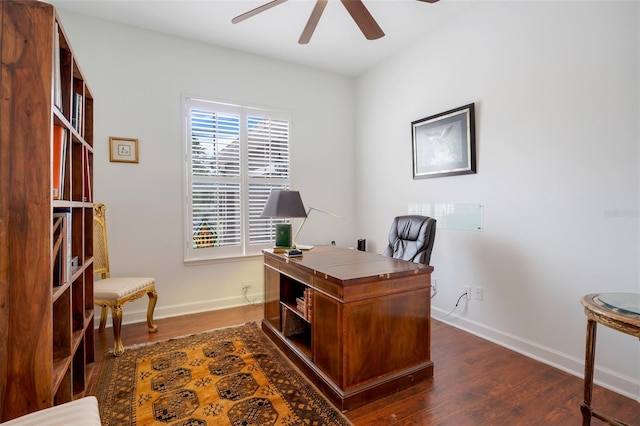 office space with dark wood-type flooring and ceiling fan