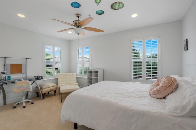 carpeted bedroom with ceiling fan