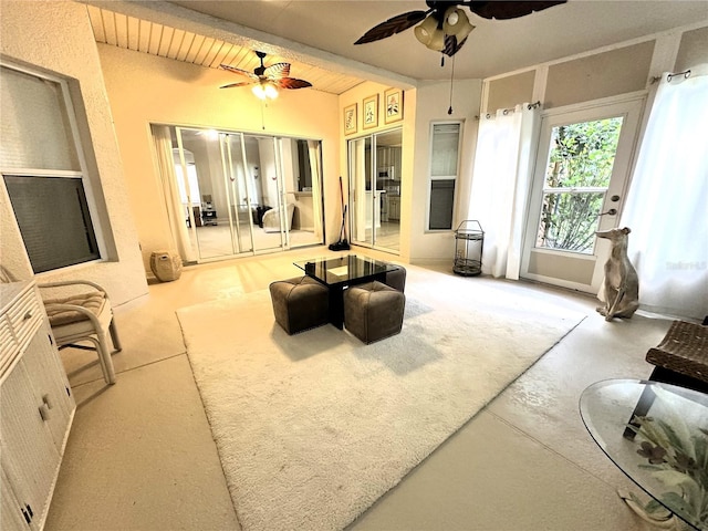 681 Coronado Dr, Kissimmee, FL 34759 - living area featuring beamed ceiling, ceiling fan, and wood ceiling
