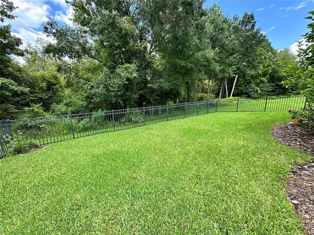 681 Coronado Dr, Kissimmee, FL 34759 - view of yard featuring fence