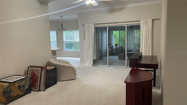 681 Coronado Dr, Kissimmee, FL 34759 - sitting room featuring carpet floors, crown molding, a ceiling fan, and a chandelier