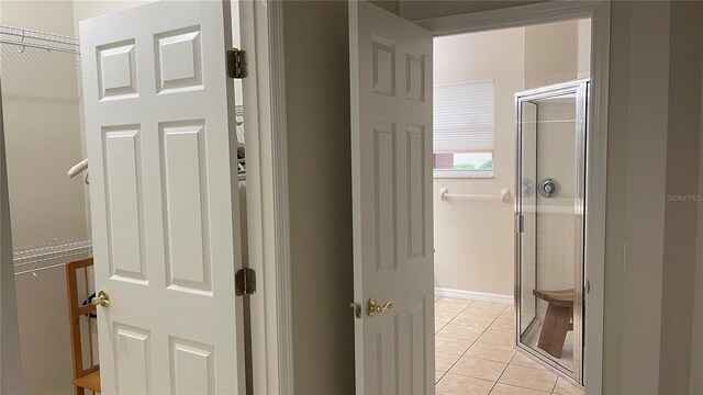 681 Coronado Dr, Kissimmee, FL 34759 - corridor with light tile patterned floors