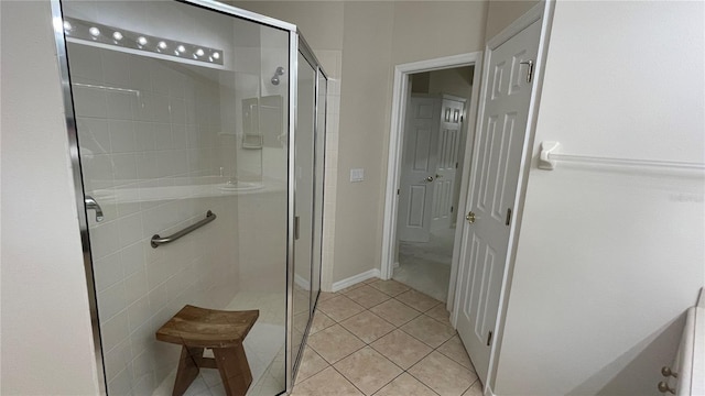 681 Coronado Dr, Kissimmee, FL 34759 - bathroom featuring a shower stall and tile patterned floors