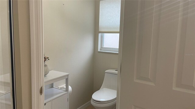 681 Coronado Dr, Kissimmee, FL 34759 - bathroom featuring toilet