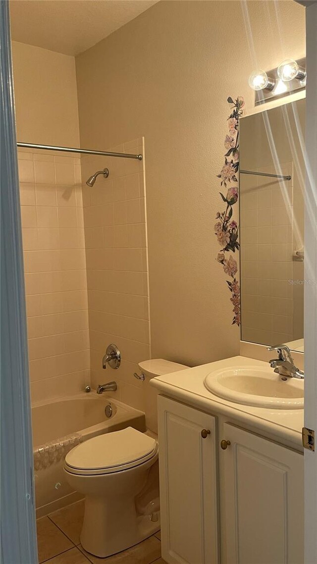 681 Coronado Dr, Kissimmee, FL 34759 - bathroom featuring vanity, tub / shower combination, and tile patterned flooring