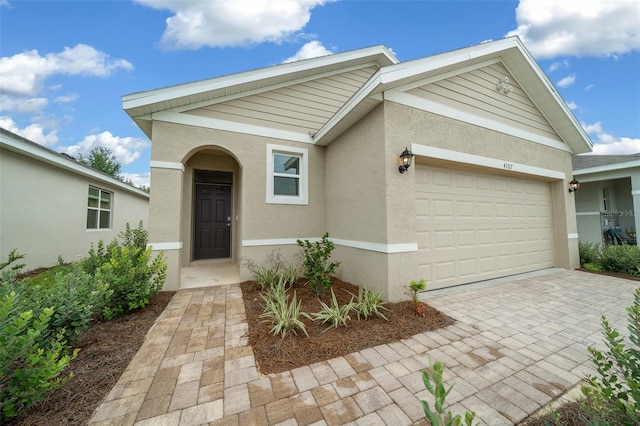 view of front of property featuring a garage