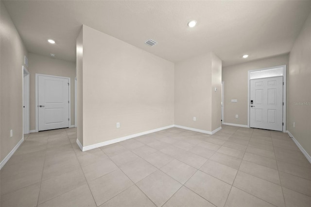 interior space featuring light tile patterned floors