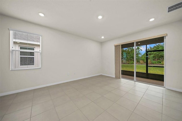 empty room featuring light tile patterned floors