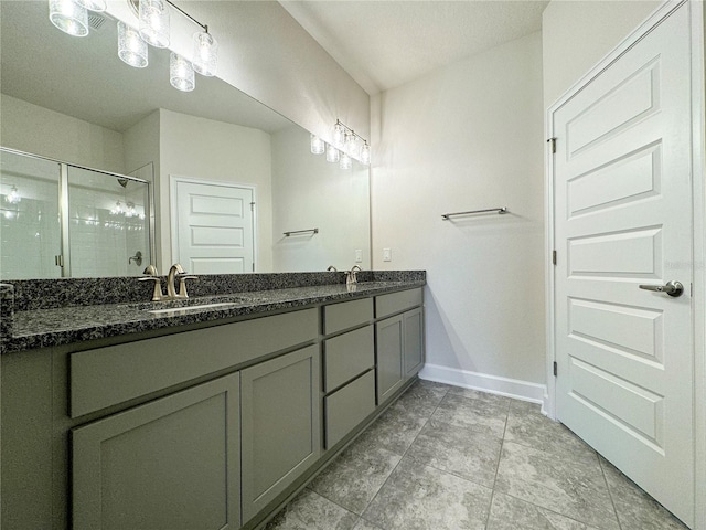 bathroom with vanity and an enclosed shower