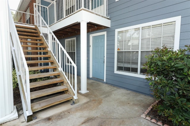 entrance to property with a patio area