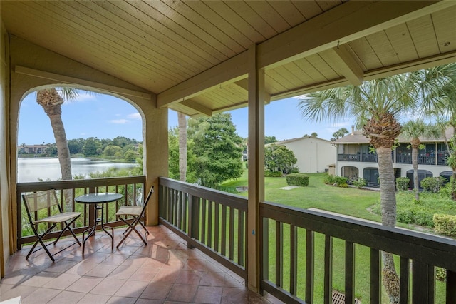 balcony featuring a water view