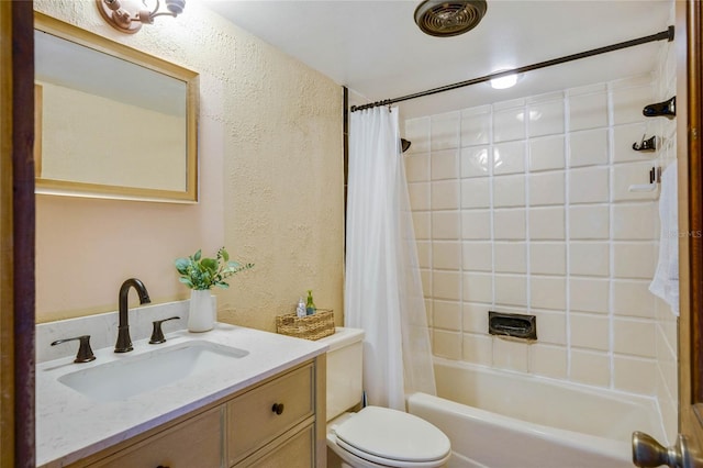 full bathroom with vanity, toilet, and shower / bath combo with shower curtain