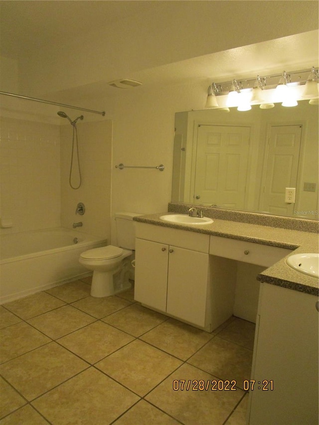 full bathroom with tile patterned flooring, vanity, toilet, and shower / washtub combination