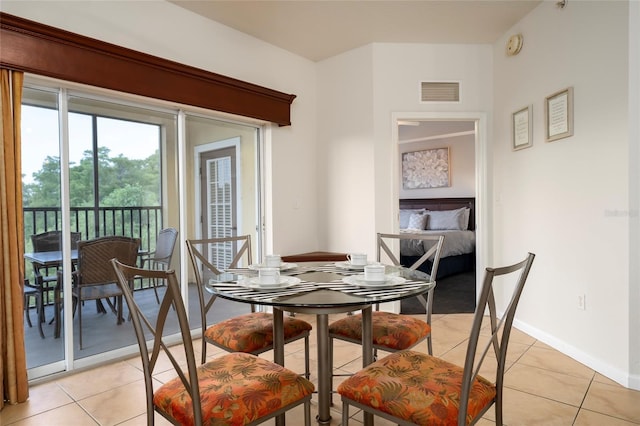 dining room with light tile patterned floors