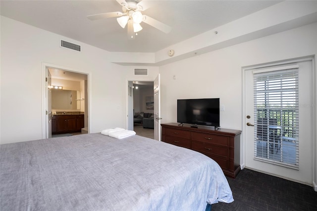 bedroom with access to outside, ceiling fan, and connected bathroom