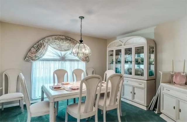 view of carpeted dining room