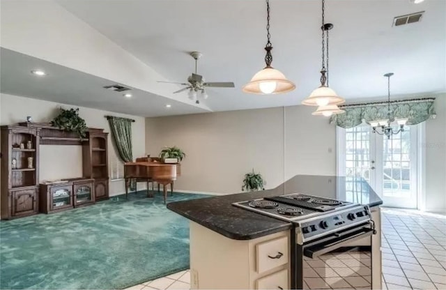 kitchen with ceiling fan, hanging light fixtures, light carpet, black range, and vaulted ceiling