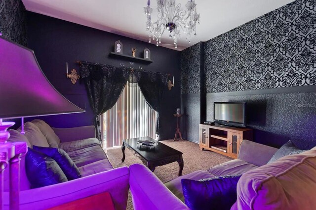 carpeted living room featuring a chandelier