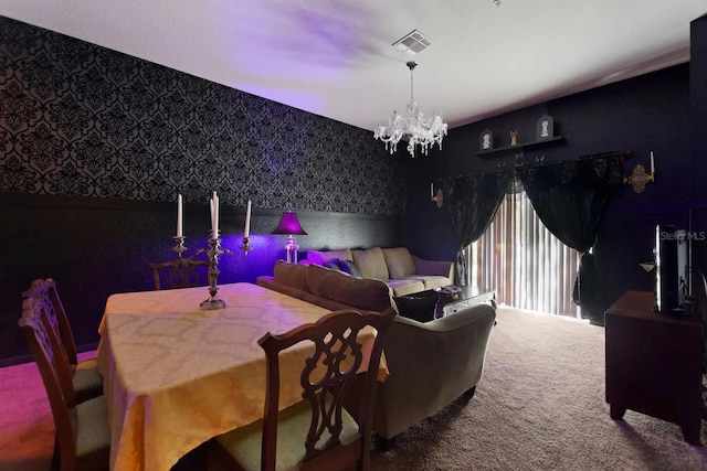 carpeted dining area with a notable chandelier