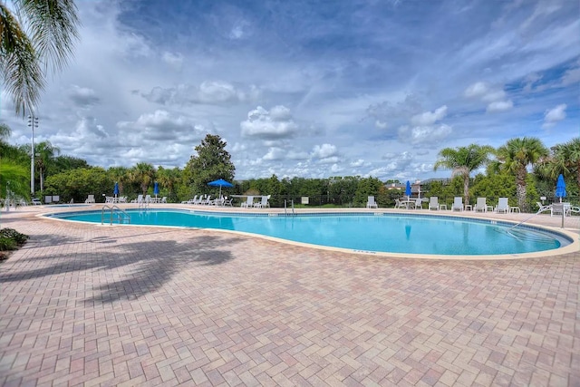 view of pool with a patio