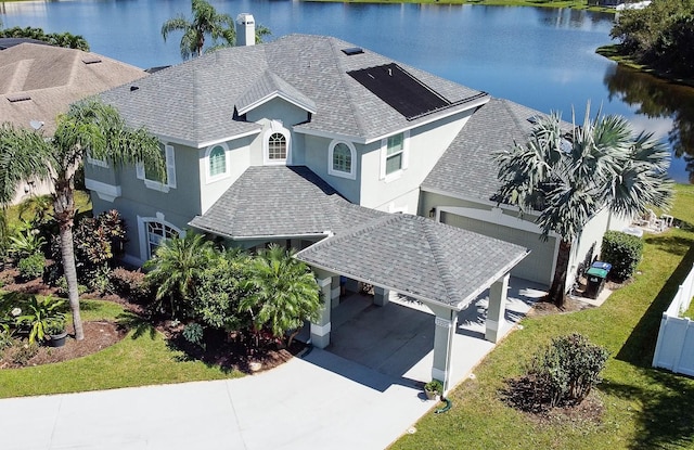 drone / aerial view featuring a water view