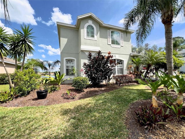 view of front of property featuring a front yard