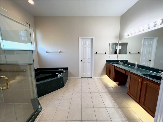 bathroom featuring vanity, tile patterned floors, and separate shower and tub