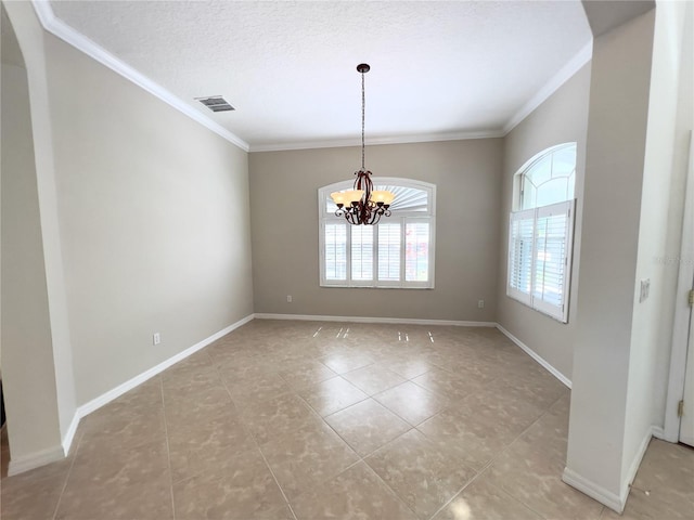 unfurnished dining area featuring an inviting chandelier, ornamental molding, and a textured ceiling