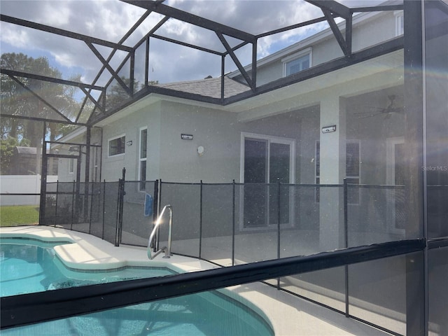 view of pool with a lanai and a patio