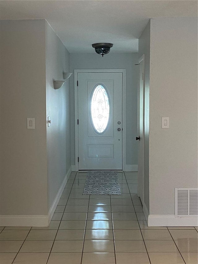 view of tiled foyer