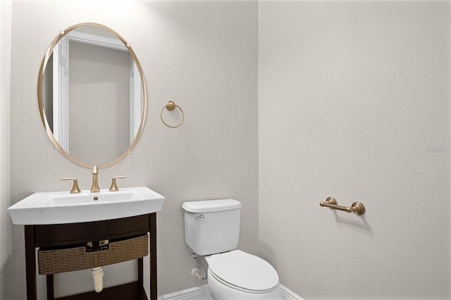 bathroom featuring sink and toilet