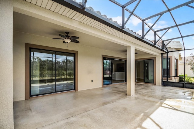 view of patio with a lanai and ceiling fan